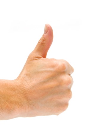 Man`s hand thumbs up sign. Concept for agreement, positive.の写真素材