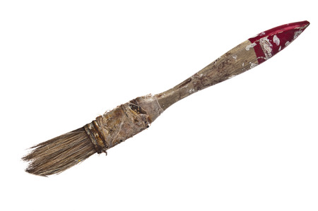 Old paint brush on white backgroundの写真素材