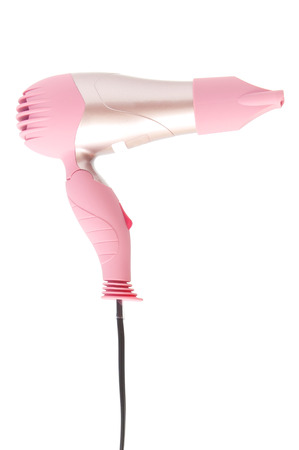 Pink hairdryer isolated on whiteの写真素材