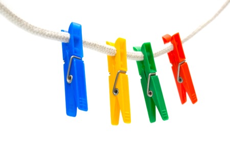 Four multi-coloured  clothespins の写真素材