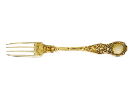 Old,antique fork on isolatedの写真素材