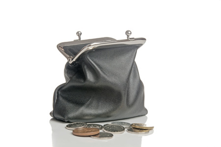 Black purse and coins on white の写真素材