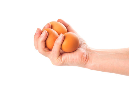 Three eggs in handの写真素材