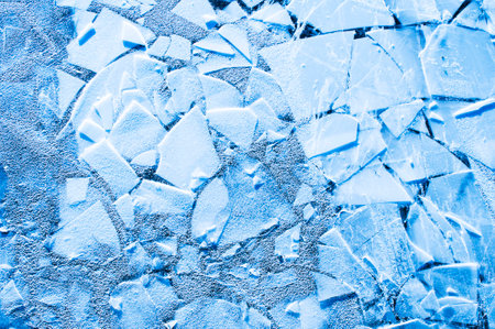 Blue ice on a riverの写真素材