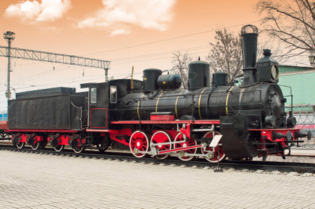Old steam locomotive at railway station