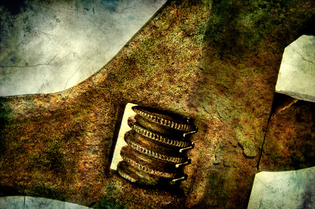 Rusty pipe wrench on grunge backgroundの写真素材