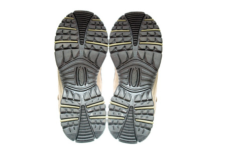 Soles of boots on white backgroundの写真素材