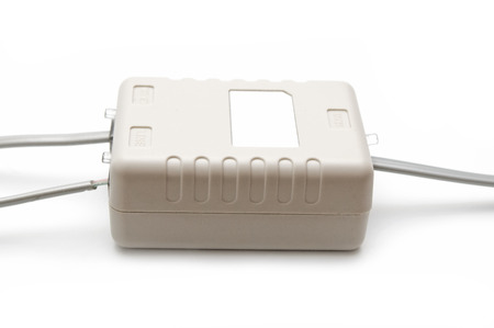 Splitter ADSL and cables on white backgroundの写真素材