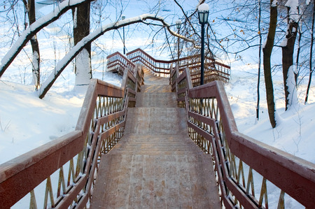 Wooden stairs in winter parkの写真素材