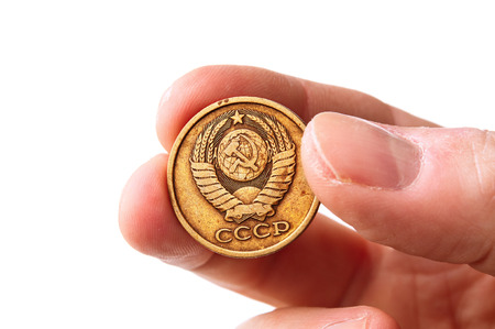Old soviet copecks coin in handの写真素材