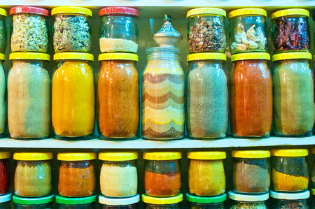 Assorted ground spices in jarsの写真素材