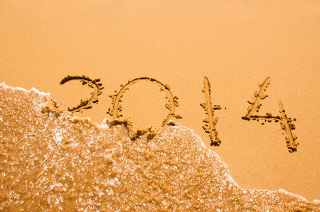 2014 inscription on the sand near seaの写真素材