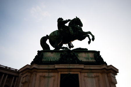 Silhouette of the statue of the Prinz Eugen on Heldenplatz in Hofburg near to the Austrian national library. Vienna, Austria.のeditorial素材