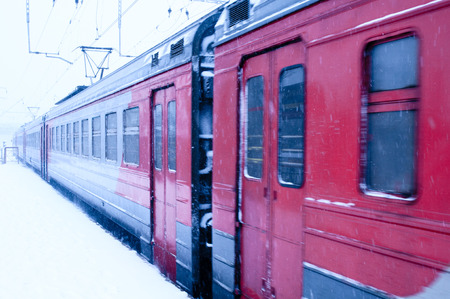 Electric train in snowfallの写真素材