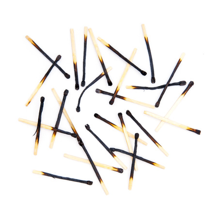 Burned matches on white backgroundの写真素材