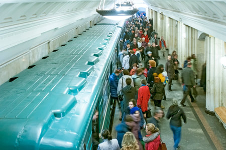 Passengers crowd in subway station