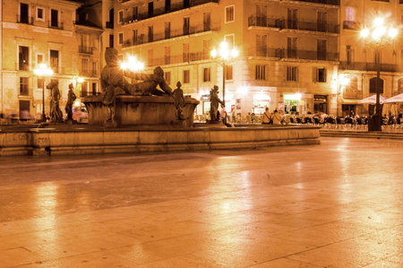 Square of Saint Mary's and fountain Rio Turia at night, Valencia, Spainのeditorial素材