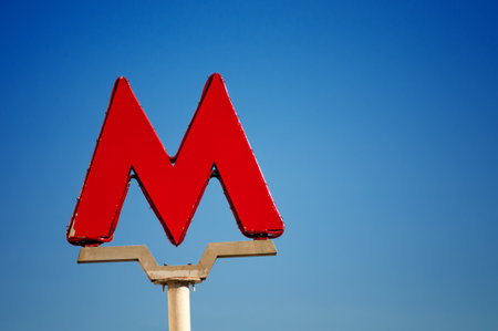 Letter "M" - the symbol of the Moscow metro on blue sky backgroundのeditorial素材