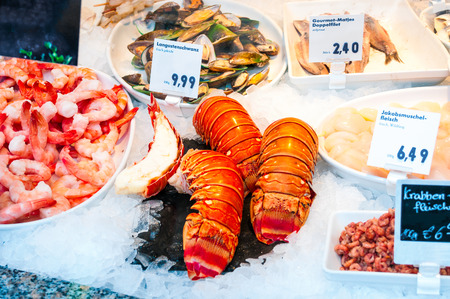 Fresh seafood stall at a marketの写真素材