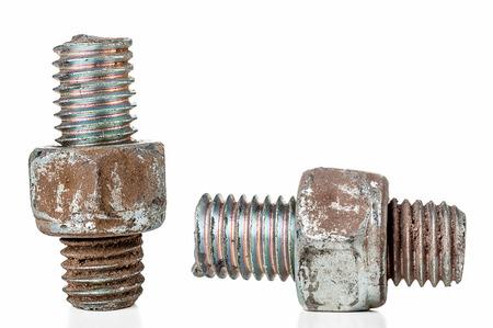 Two grunge screws on white backgroundの写真素材