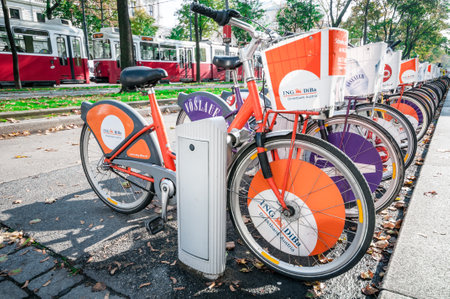 Rental bikes are lined up in the street of Vienna, Austria. Vienna has over 120 stations with...