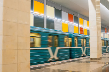 MOSCOW, RUSSIA - APRIL 04, 2016: Arriving subway train at metro station Salarjevo in Moscow, Russia. It was opened in February 15, 2016.のeditorial素材