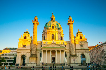 VIENNA, AUSTRIA - APRIL 24, 2016: View of famous Saint Charles's Church (Wiener Karlskirche) at Karlsplatz at sunsetのeditorial素材