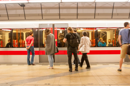 PRAGUE, CZECH REPUBLIC - JUNE 16, 2016: Subway train and passengers at Kobylisy stationのeditorial素材