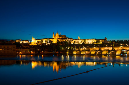 View on Vltava river and St.Vitus cathedral in Prague Castle at night, Czech Republicのeditorial素材
