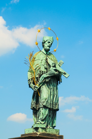 John Nepomuk staute on Charles Bridge in Pragueの写真素材