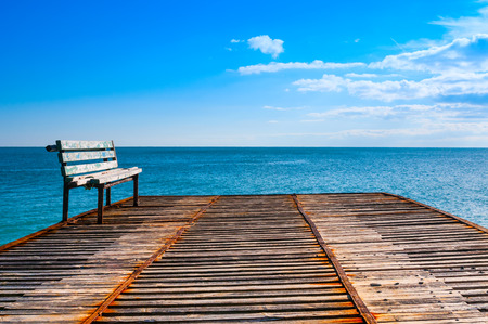 Old grunge pier in the seaの写真素材