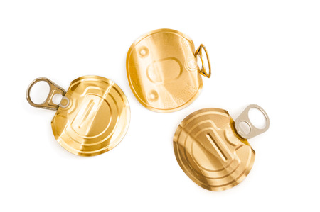 Used tin lids on white background
