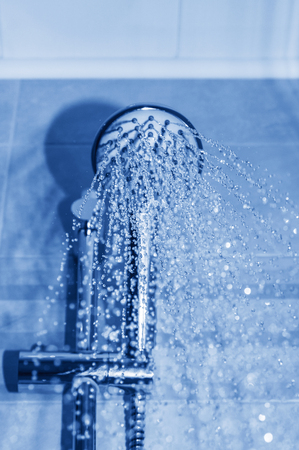 Running water fron shower faucetの写真素材