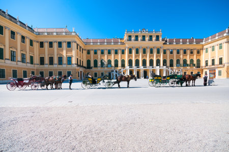 VIENNA, AUSTRIA - JUNE 07, 2017: Traditional old-fashioned fiacres in Schonbrunn Palaceのeditorial素材