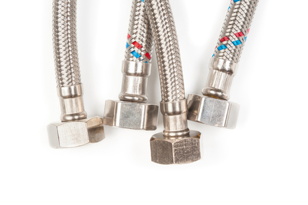 Flexible hoses close up on white backgroundの写真素材