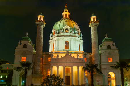View of famous Saint Charles's Church (Wiener Karlskirche) at Karlsplatz by nightの写真素材