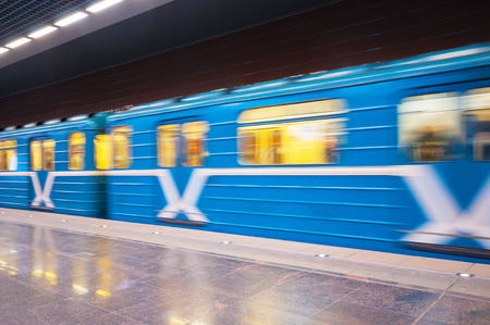 Moving train at subway station