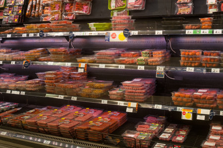 VALENCIA, SPAIN- JUNE 21, 2019: Sausage stall in the supermarket Carrefour in Valencia, Spainのeditorial素材
