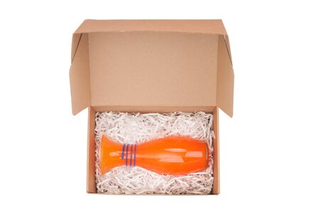 Decorative vase packed in cardboard box isolated on white background