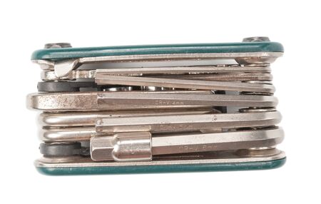 Old  multi purpose bike tool close up isolated on white background