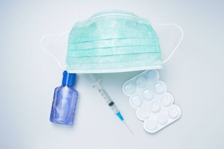 Virus medical protection products on blue background