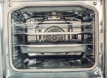 Inside of empty electric stove oven