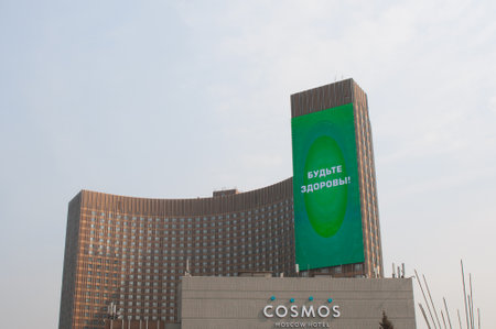 Moscow, Russia - March 28, 2020: Inscription "Be healthy" on hotel "Cosmos" against the spread of coronavirusのeditorial素材