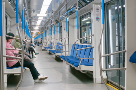Moscow, Russia - March 28, 2020: People wearing in medical mask for protect of coronavirus in subway carriageのeditorial素材