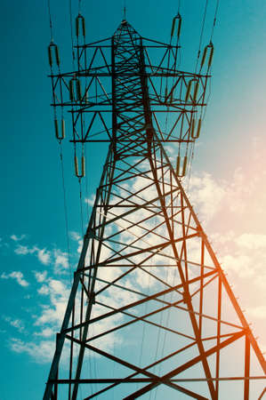 High electric power mast on sky background