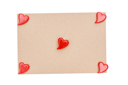 Red hearts on cardboard background. Valentines day card