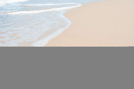 Soft sea wave on clean sandy beachの写真素材