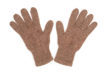 Warm woolen winter gloves on white backgroundの写真素材