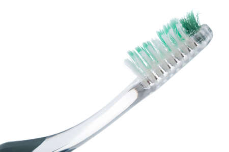 Used toothbrush close up isolated on white backgroundの写真素材