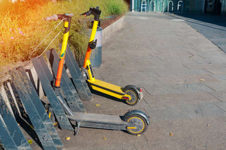 Electric scooter rental on a street of city
